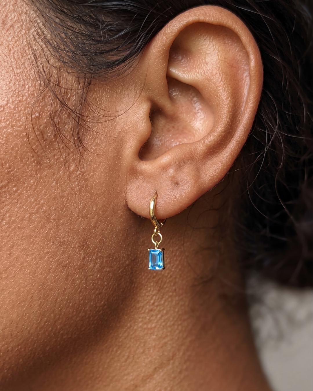 Blue Stone Gold Huggie Earrings — image 1