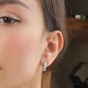 Geometric Pavé Huggie Earrings — image 9