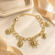 Sun & Heart Charm Gold Bangle — image 6