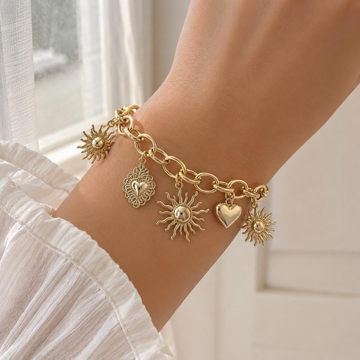Sun & Heart Charm Gold Bangle — image 4